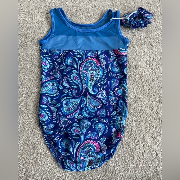 Gently used Plum Practicewear leotard in size child large with scrunchie - Picture 2 of 5